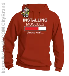 Installing muscles please wait... - Bluza z kapturem pomarańcz